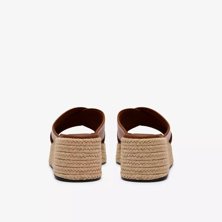 Mule da donna Tessiah 2 con zeppe in pelle color cuoio Mule da donna Tessiah 2 con zeppe in pelle color cuoio