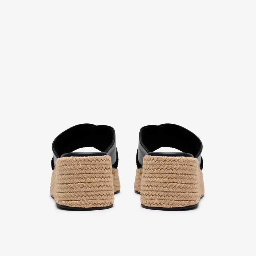 Mule da donna Tessiah 2 con zeppe in pelle nera Mule da donna Tessiah 2 con zeppe in pelle nera