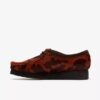 Wallabee da donna. Wallabee marroni con stampa bovina Wallabee da donna. Wallabee marroni con stampa bovina