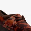 Wallabee da donna. Wallabee marroni con stampa bovina Wallabee da donna. Wallabee marroni con stampa bovina