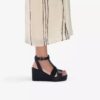 Zolle da donna Sabina Hope in pelle nera con zeppe